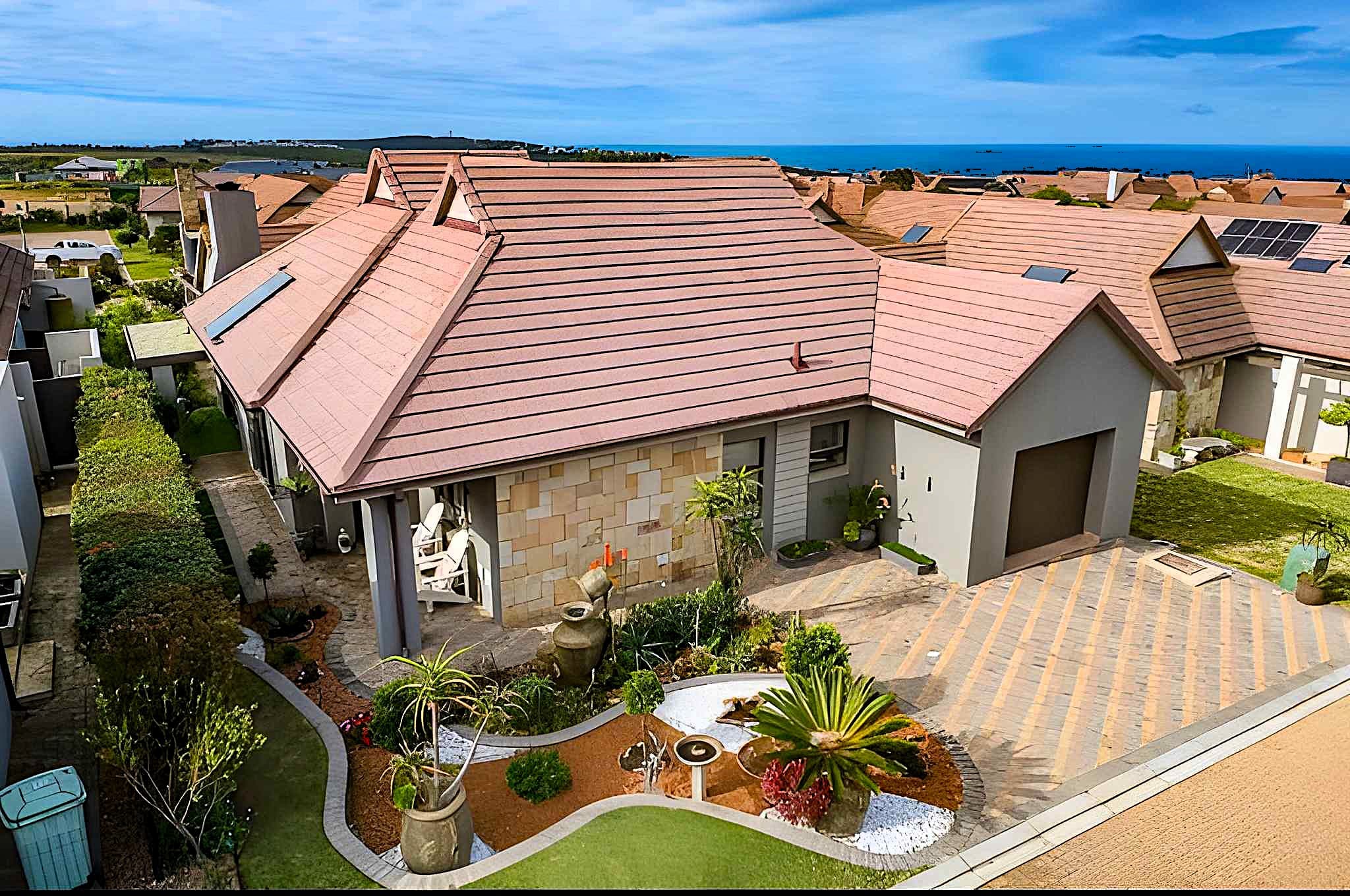 Clean tiled residential roof after professional washing